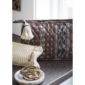 trousse de toilette matelassee tissu ikat marron pompon madam stoltz